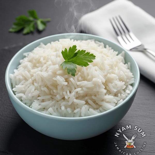 Steaming white rice in a light blue bowl, garnished with parsley, with a fork and napkin.